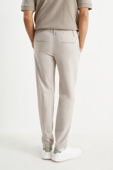 Uomo - Pantaloni chino - tapered fit - beige chiaro