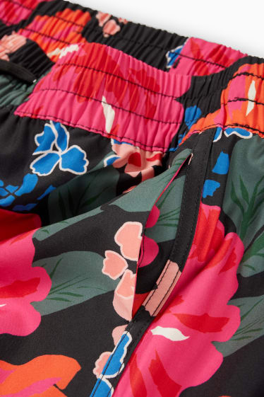 Dámské - Koupací šortky - LYCRA® - s květinovým vzorem - černá