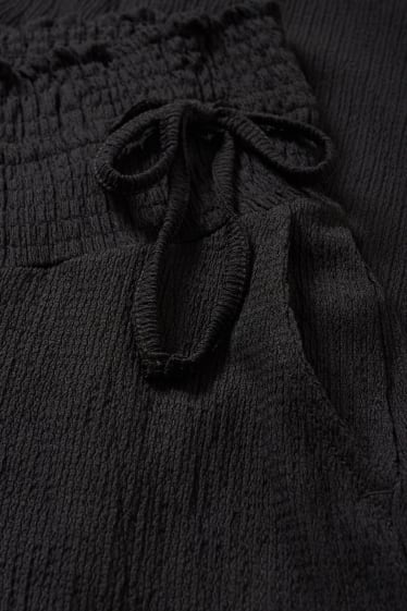 Women - Maternity trousers - palazzo - black