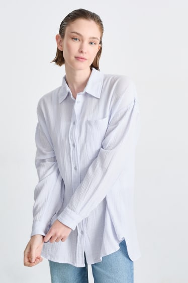 Tieners & jongvolwassenen - CLOCKHOUSE - blouse van mousseline - lichtblauw