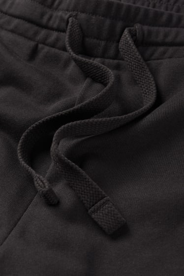 Dámské - Teplákové šortky basic - černá