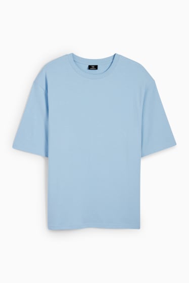 Mężczyźni - T-shirt oversize - jasnoniebieski