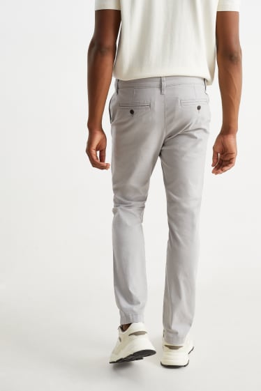 Uomo - Pantaloni chino - slim fit - grigio