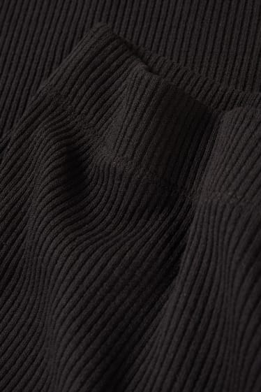 Dámské - Pletená sukně - černá