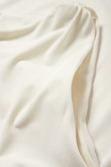 Femmes - Haut orné d'un nœud - blanc crème