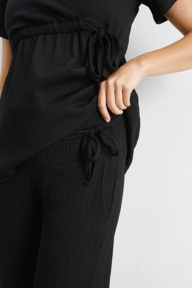 Women - Maternity trousers - palazzo - black