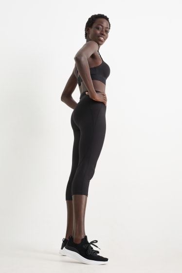 Donna - Leggings capri sportivi - effetto modellante - 4 Way Stretch - nero