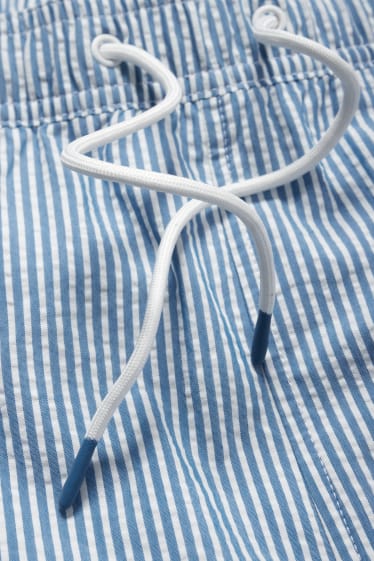 Men - Swim shorts - striped - blue / white