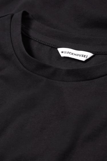 Dona - CLOCKHOUSE - samarreta de màniga curta crop - negre