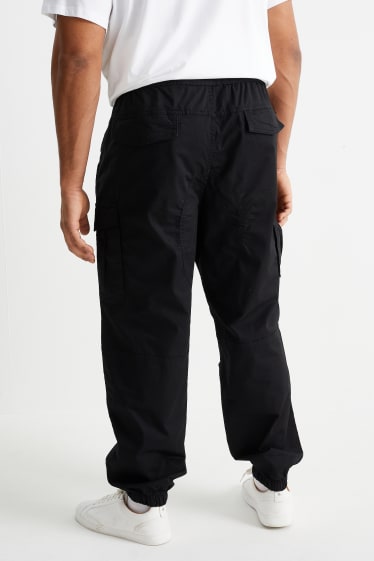 Mężczyźni - Spodnie bojówki - tapered fit - LYCRA® - czarny