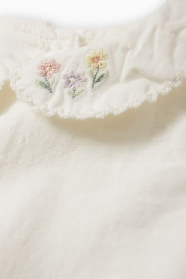 Niemowlęta - Kwiatki - sukienka niemowlęca - kremowobiały