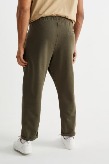 Hommes - Pantalon de jogging - vert foncé
