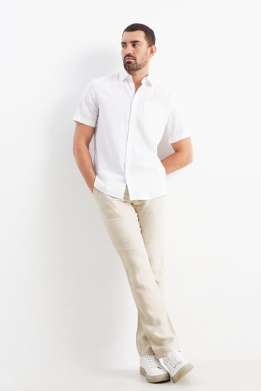 Uomo - Pantaloni di lino con cintura - regular fit - beige