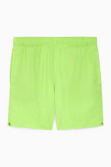 Pánské - Funkční šortky - neonově zelená