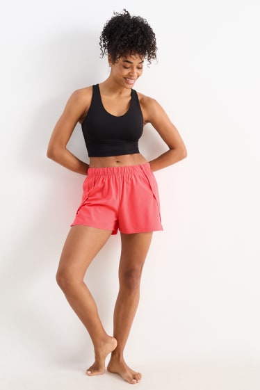 Mujer - Shorts funcionales - 4 Way Stretch - look 2 en 1 - fucsia