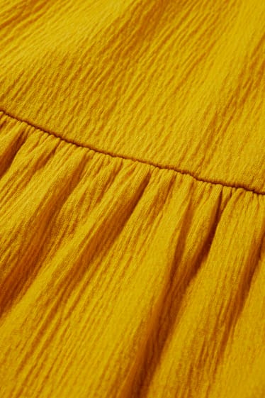 Dámské - Áčkové šaty s výstřihem ve tvaru V - světle oranžová