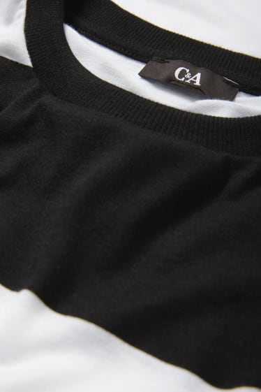 Dámské - Pletený svetr - s krátkým rukávem - pruhovaný - černá/bílá