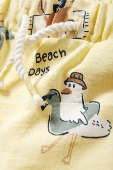 Bebés - Playa - shorts deportivos para bebé - amarillo claro