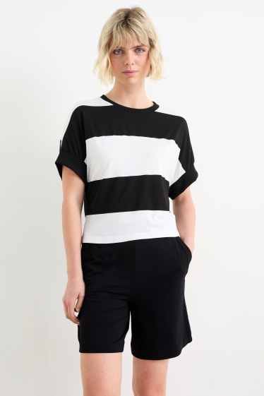 Dámské - Pletený svetr - s krátkým rukávem - pruhovaný - černá/bílá
