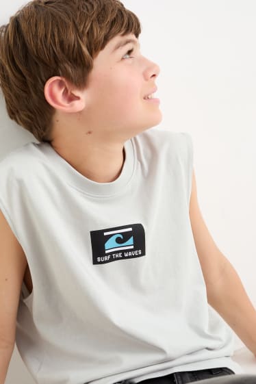 Niños - Pack de 2 - surfista - camiseta sin mangas y camiseta de manga corta - naranja