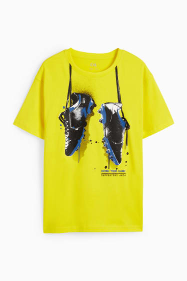 Children - Football boots - short sleeve T-shirt - yellow