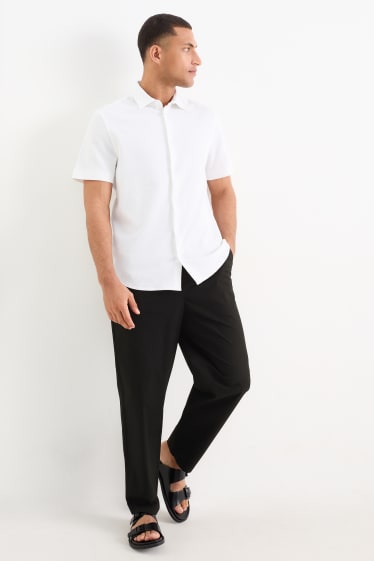 Hommes - Chino - tapered fit - noir