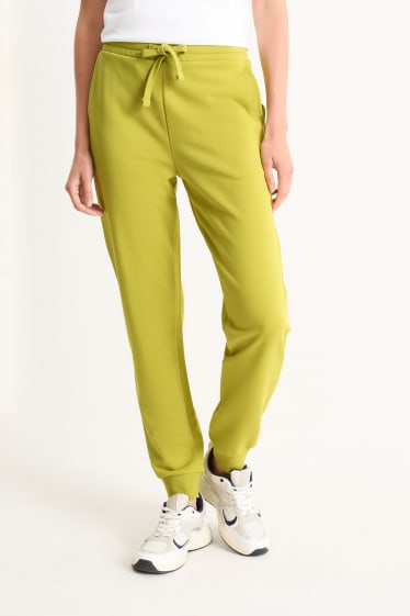Dona - Pantalons de xandall - verd clar