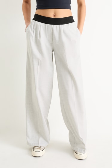 Adolescenți și tineri - CLOCKHOUSE - pantaloni de stofă - talie medie - wide leg - alb / negru