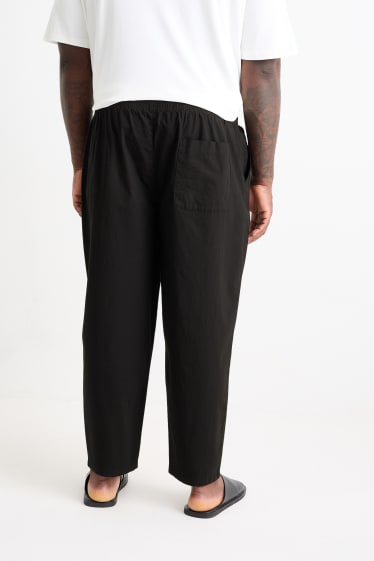 Uomo - Pantaloni chino - tapered fit - nero