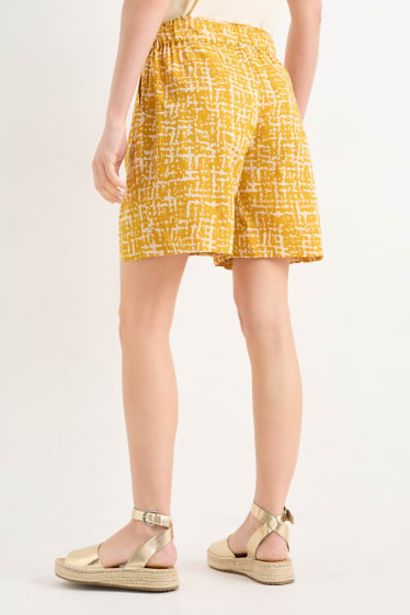 Femmes - Short - mid waist - à motif - jaune