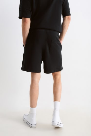 Hommes - Shorts en molleton - noir