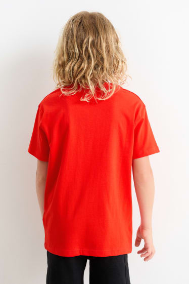 Children - Football boots - short sleeve T-shirt - red