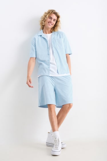 Men - Terry cloth sweat shorts - light blue