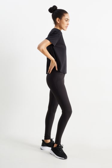 Kobiety - Sportowe legginsy - 4 Way Stretch - czarny