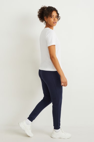 Dona - Pantalons de xandall tècnics - blau fosc