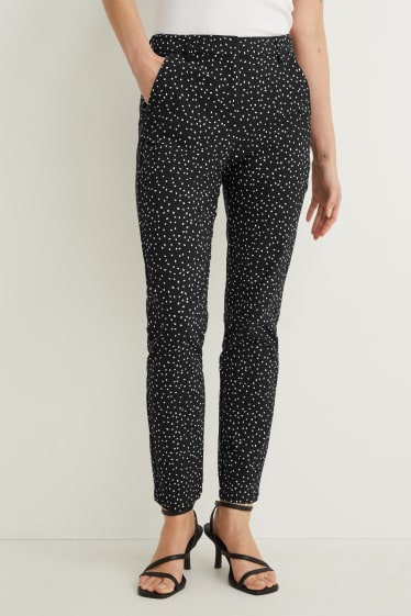 Femmes - Pantalon - mid waist - slim fit - Flex - à pois - noir