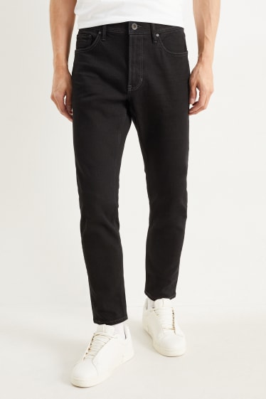 Men - Slim tapered jeans - black