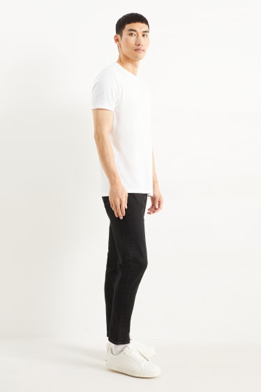 Men - Slim tapered jeans - black