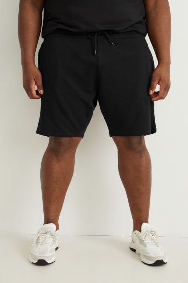 Uomo - Shorts di felpa - nero