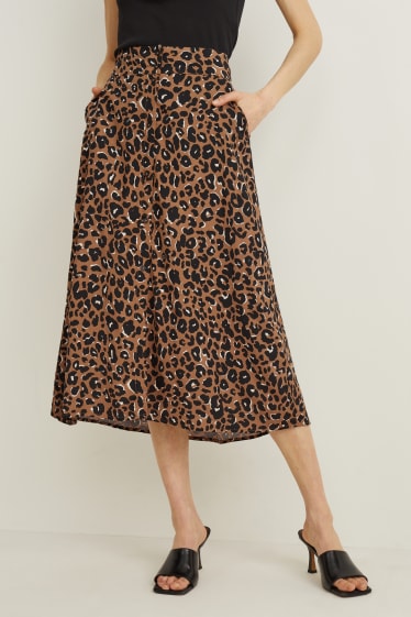 Dona - Faldilla - estampada - marró