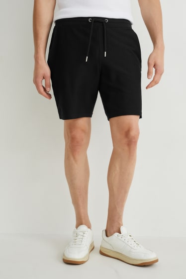 Uomo - Shorts - nero