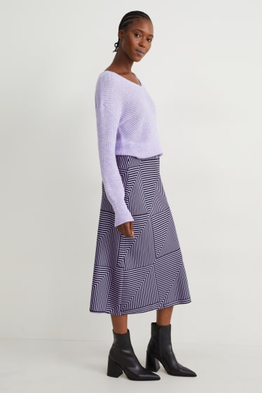 Dona - Faldilla - estampada - blau fosc