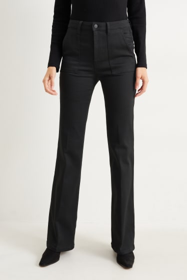 Dona - Pantalons de tela - high waist - flared - negre