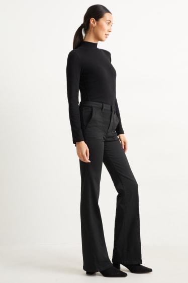 Dona - Pantalons de tela - high waist - flared - negre