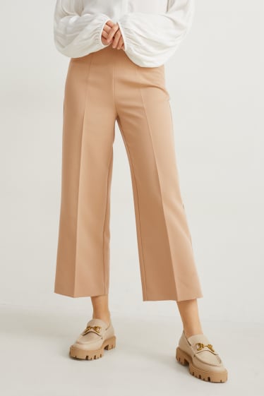 Kobiety - Spodnie materiałowe - wysoki stan - szerokie nogawki - jasnobrązowy