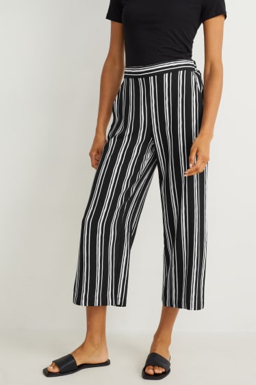Femmes - Pantalon de toile - mid waist - palazzo - à rayures - noir / blanc