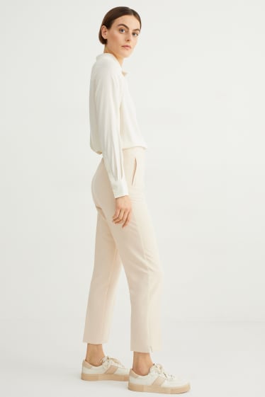 Dona - Pantalons de tela - high waist - regular fit - beix clar