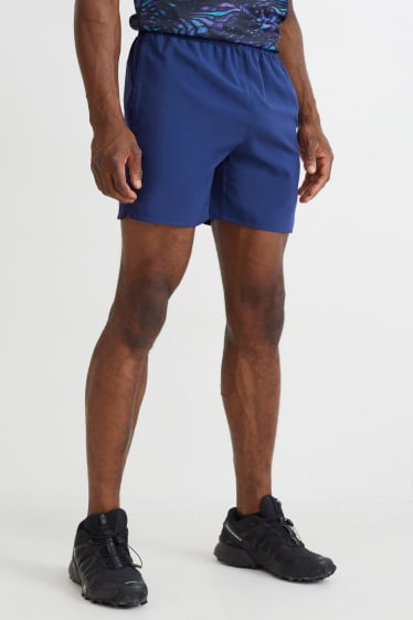 Home - Pantalons curts tècnics - blau