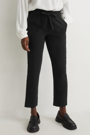 Dona - Pantalons de tela - high waist - regular fit - negre