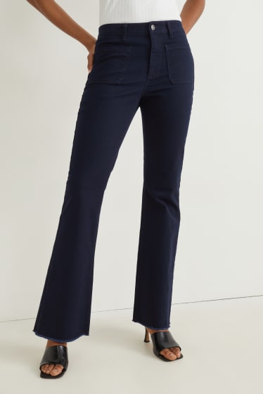Dona - Pantalons de tela - high waist - flared - blau fosc